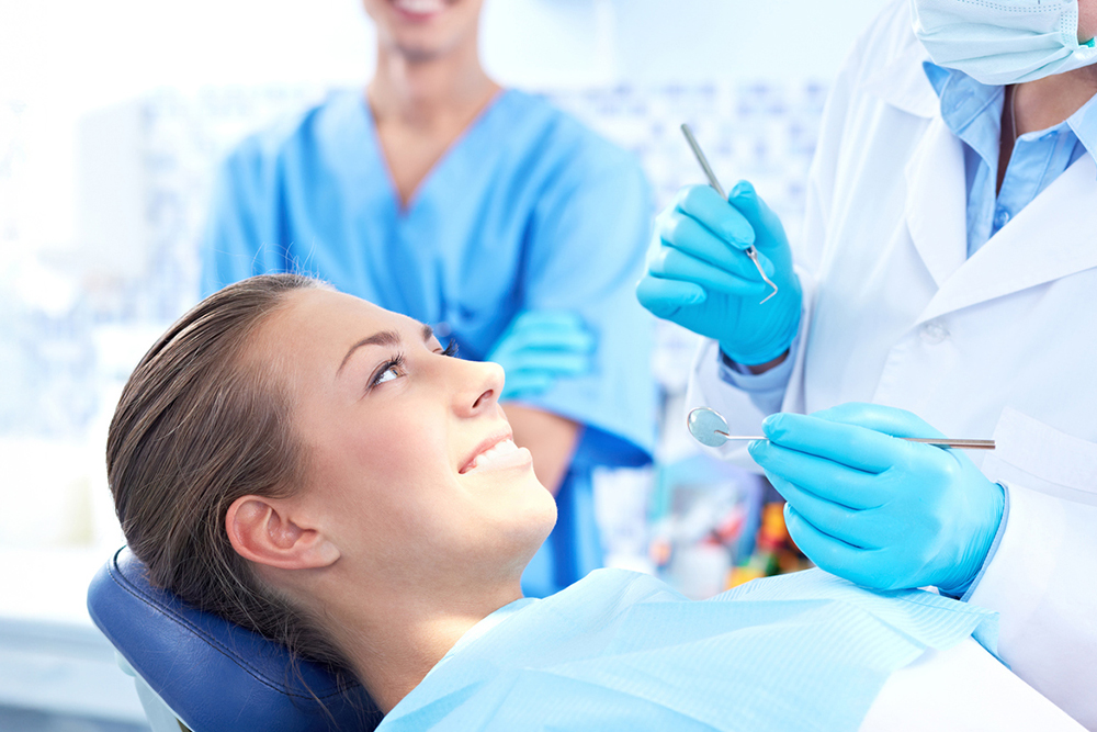 New patient consultation at King Street Dentistry in Cambridge with dentist explaining treatment plan during first visit